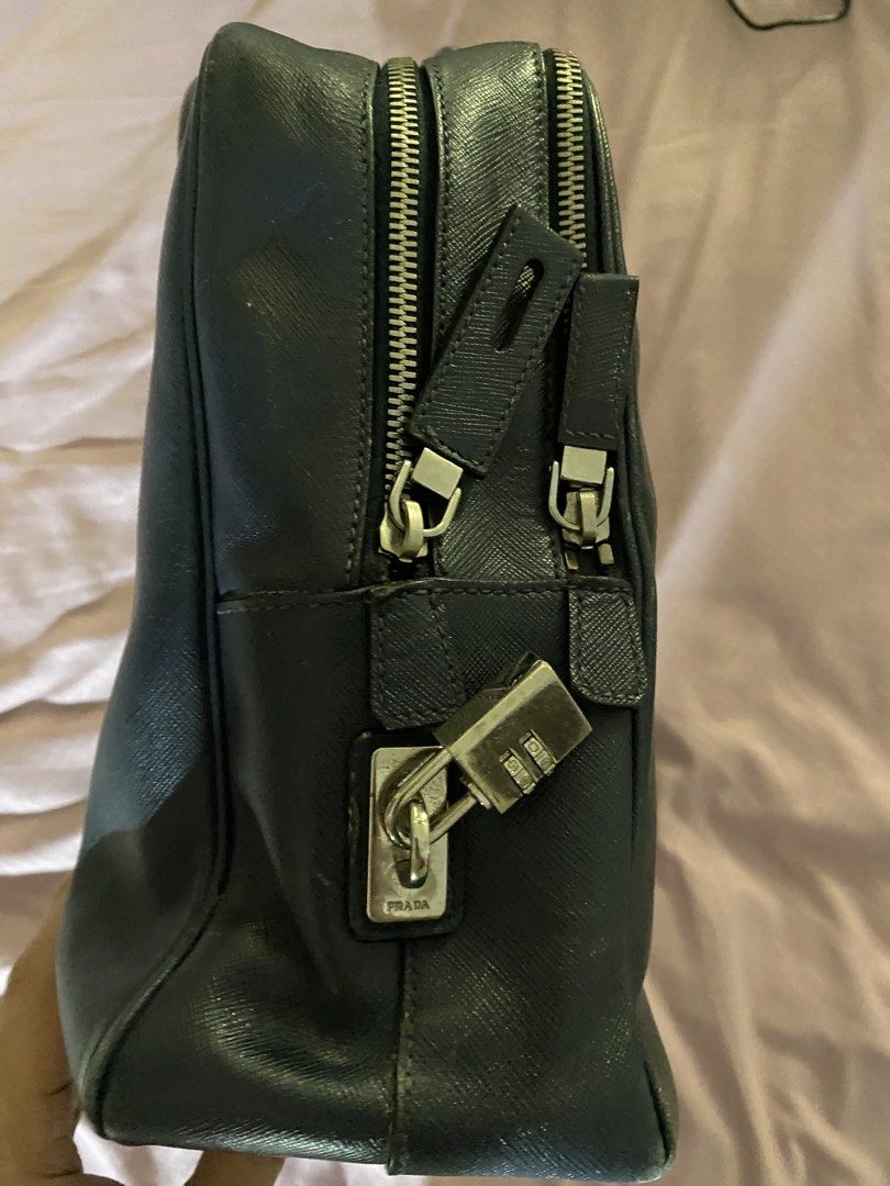 Prada briefcase (Category: Luxury Bags & Wallets) located in Manila. Submitted by lauro.catibayan (Listing ID 1434502846, Image 2). Description: Prada Safianobriefcase color blue. With rubs at the edges .