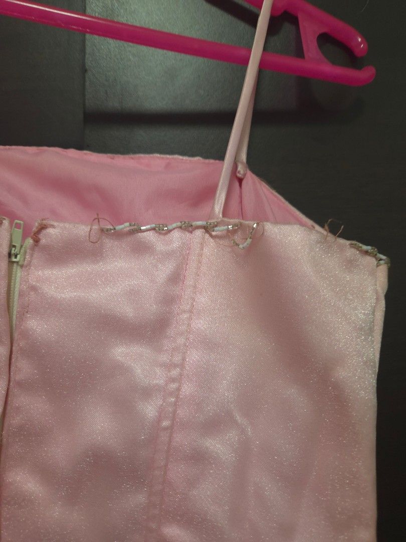 Pre-loved Pink Formal Dress (Category: Dresses) located in Pasig City. Submitted by whitepaws.b278660 (Listing ID 1434464874, Image 3). Description: - Pink formal dress - Fitted bodice with beaded accent - Spaghetti straps - Floor-length, flowing skirt - Zipper closure - Ideal for special occasions -With issues as seen in pictures -Needs washing -Price negotiable Payment first before arranging shipment Price posted does not include shipping No pa