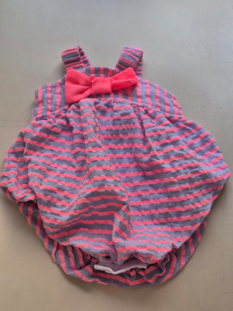 Preloved Striped Baby Romper with Bow (Category: Babies & Kids Fashion) located in Quezon City. Submitted by andi7810 (Listing ID 1434432189, Image 1). Description: - 3mos - Adorable baby romper - Pink and gray striped pattern - Cute bow detail - Snap closures for easy changes - Comfortable design with straps - Perfect for your little one!.
