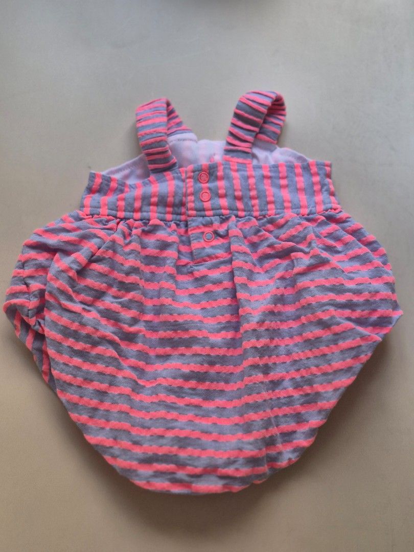 Preloved Striped Baby Romper with Bow (Category: Babies & Kids Fashion) located in Quezon City. Submitted by andi7810 (Listing ID 1434432189, Image 2). Description: - 3mos - Adorable baby romper - Pink and gray striped pattern - Cute bow detail - Snap closures for easy changes - Comfortable design with straps - Perfect for your little one!.