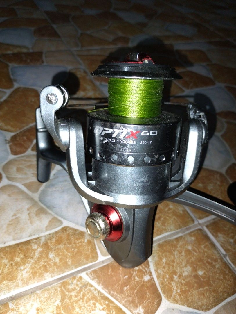 Quantum PTx 60 Fishing Reel (Category: Fishing) located in Manila. Submitted by janivsss (Listing ID 1434455239, Image 1). Description: Negotiable - Quantum PTx 60 fishing reel - Silver and black body with red accent - Black handle - Spooled with green fishing line - In good working condition Quantum Optix 60 Spinning Fishing Reel, 4 Bearings (3 + Clutch), Anti-Reverse with Smooth, Precisely-Aligned Gears.