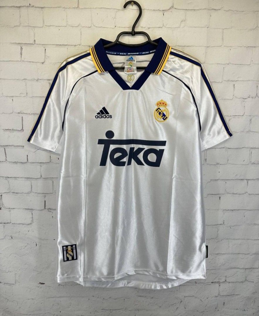 Real Madrid 1998 Retro Football Jersey (Category: Activewear) located in Singapore. Submitted by jerseycentrl (Listing ID 1434554883, Image 1). Description: brand new with tags size S M L XL 2XL 3XL avail delivery est. 6days plain: $30 add name: +5$.