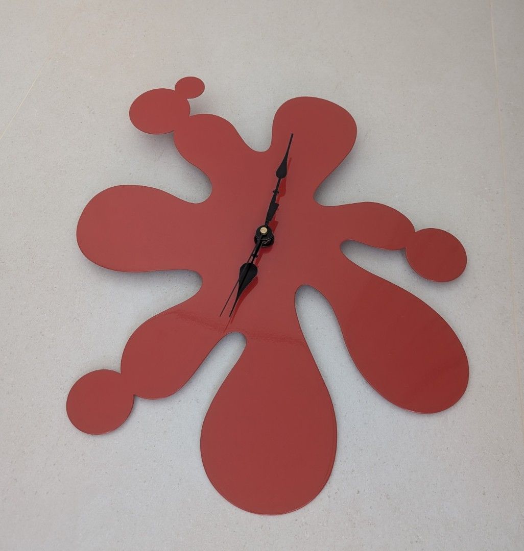 Wall Clock (Category: Clocks) located in Singapore. Submitted by carefree18 (Listing ID 1434485869, Image 3). Description: - Unique red splatter design - Modern, abstract style - Number free, so it can be placed in any direction - Easy-to-read black hands - Battery-operated (AA battery) - Adds personality to any room.