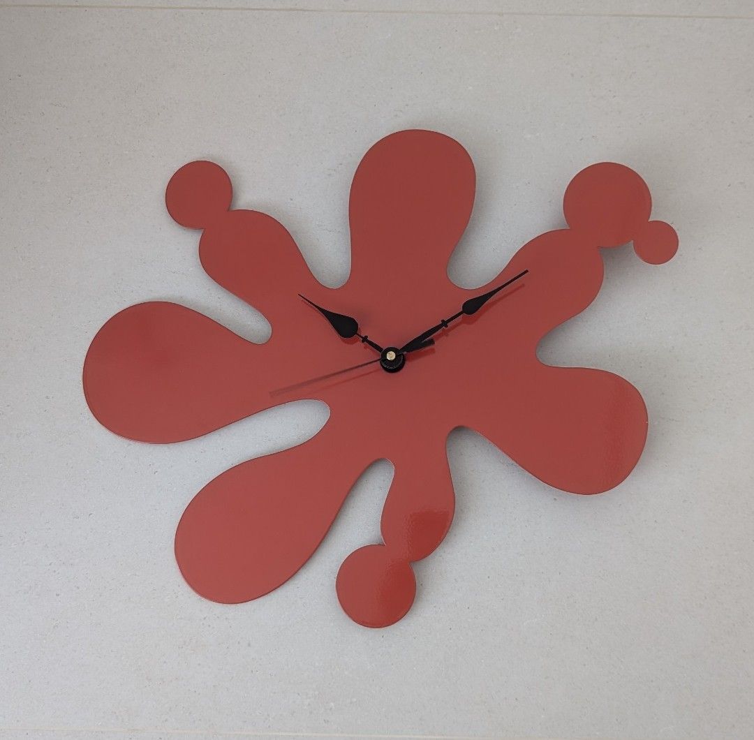 Wall Clock (Category: Clocks) located in Singapore. Submitted by carefree18 (Listing ID 1434485869, Image 2). Description: - Unique red splatter design - Modern, abstract style - Number free, so it can be placed in any direction - Easy-to-read black hands - Battery-operated (AA battery) - Adds personality to any room.