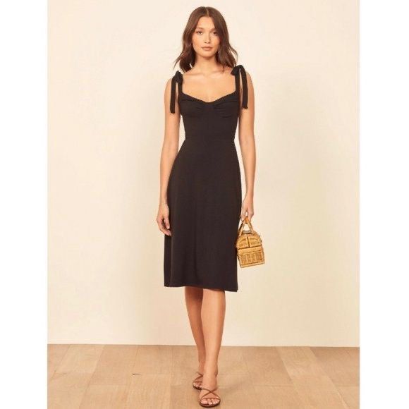 Reformation black tencel tie strap sweetheart midi dress (Category: Dresses) located in Singapore. Submitted by chairman.meow (Listing ID 1434535582, Image 1). Description: No trades Tracked mail $2 or pick up Potong Pasir Size S, stretchable Comfortable and great quality tencel fabric Good condition no defects Reformation Jeans Black Midi Wells Dress Hope you’re going to a really nice party sometime soon because these dresses wanna come. This is