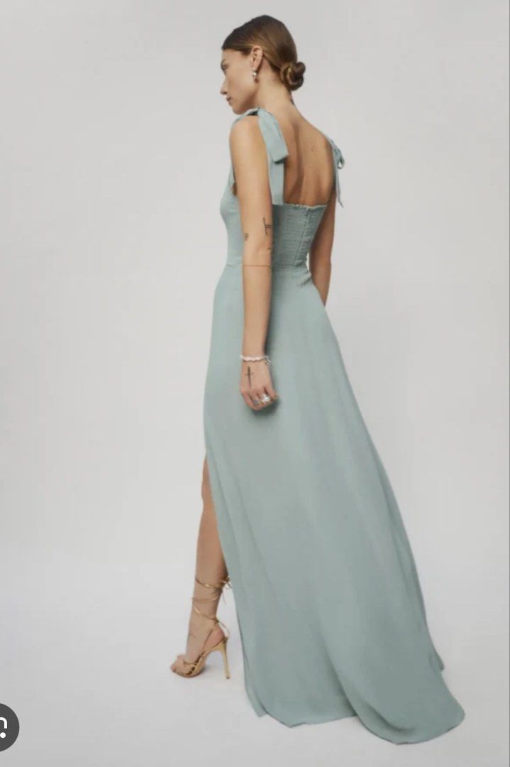 Reformation Westerly Green Maxi Dress (Category: Dresses) located in Makati City. Submitted by bibas.corner (Listing ID 1434557963, Image 2). Description: - Reformation maxi dress - Size 8, best fit for medium - Light green color - Square neckline - Tie straps - High slit on one side - Shirred back panel - Zipper closure.