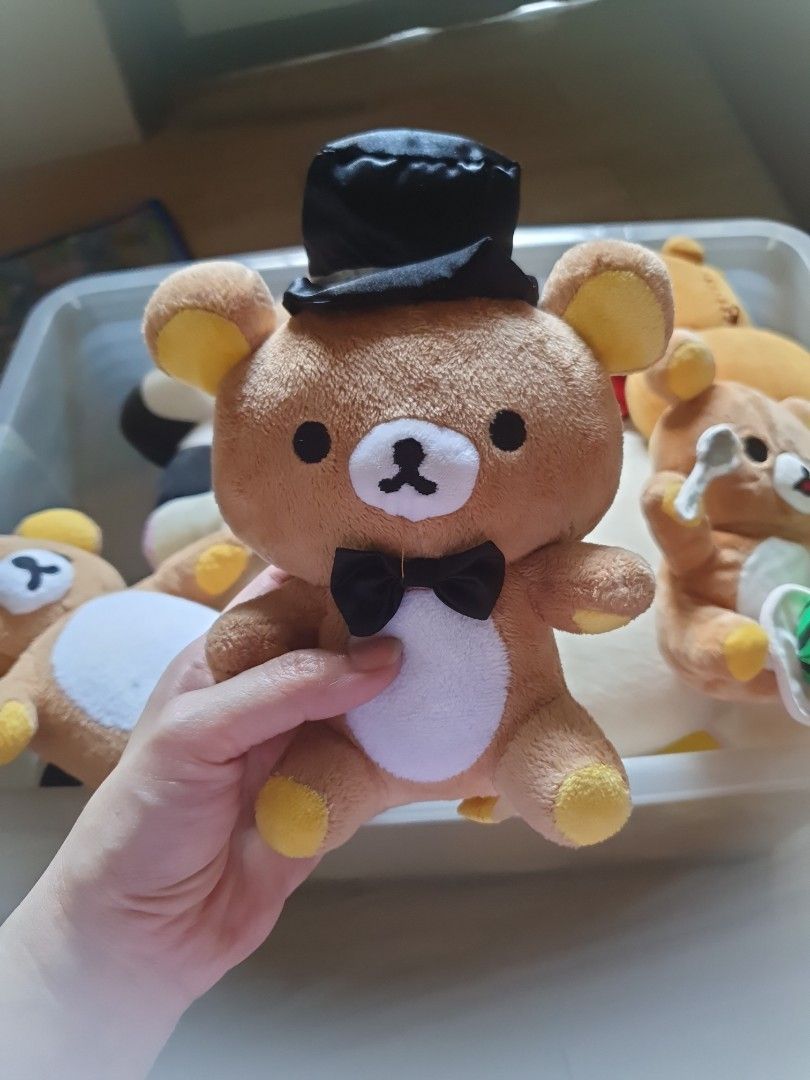 Rilakkuma Bear Plush Toy with Top Hat (Category: Plushies & Soft Toys) located in Caloocan City. Submitted by lynette1977 (Listing ID 1434436474, Image 1). Description: - Cute Rilakkuma plush toy - Features a top hat and bow tie - Soft brown fur with yellow accents - White belly and stitched back - Great gift for Rilakkuma fans!.