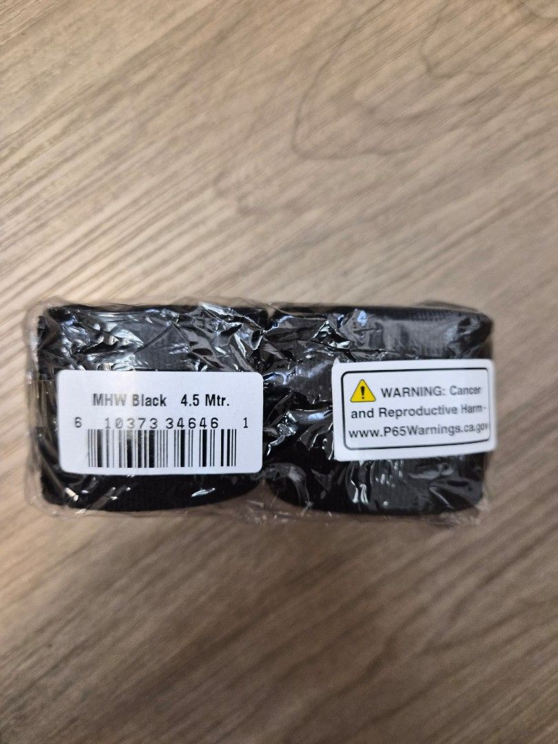 Ringside Hand Wraps - Black, 4.5 Meters (Category: Other Sports Equipment and Supplies) located in Quezon City. Submitted by jhnsn (Listing ID 1434447648, Image 2). Description: - Ringside black hand wraps - Mexican-style - 4.5 meters long (180 inches) - Brand new, in original packaging - Perfect for boxing and combat sports - Slightly elastic cotton-blend wraps designed for superior wrist and knuckle protection - Features a thumb loop and hook-a