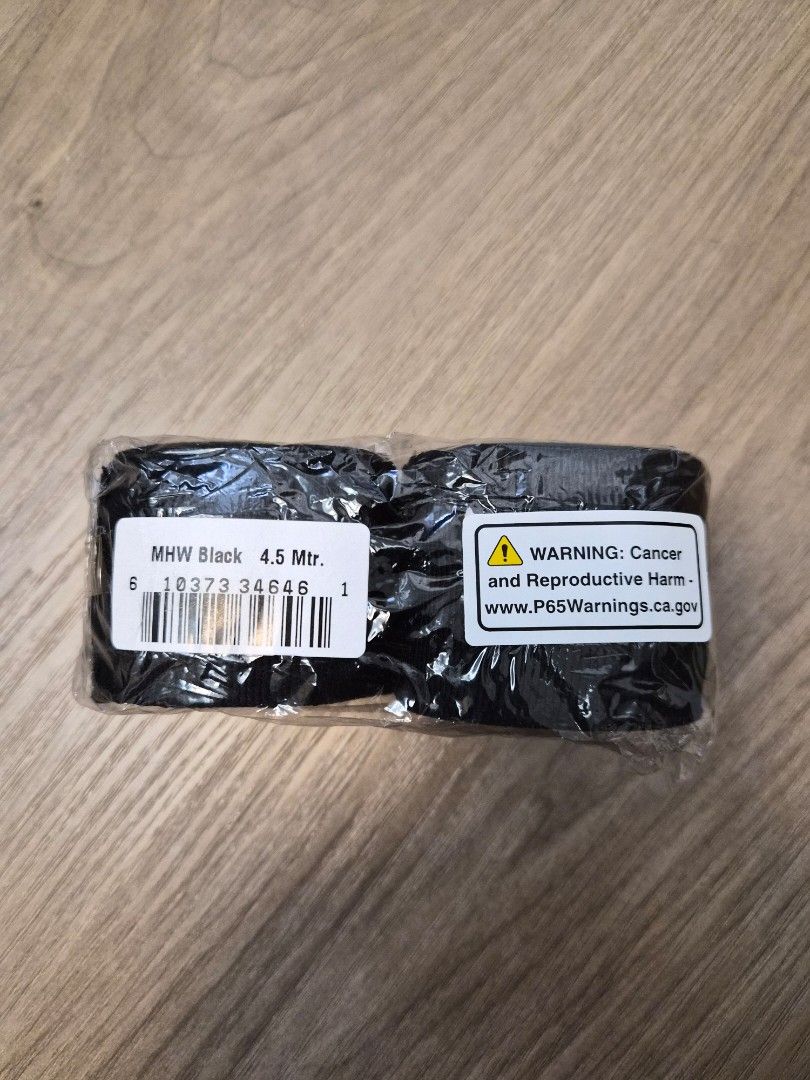Ringside Hand Wraps - Black, 4.5 Meters (Category: Other Sports Equipment and Supplies) located in Quezon City. Submitted by jhnsn (Listing ID 1434447648, Image 3). Description: - Ringside black hand wraps - Mexican-style - 4.5 meters long (180 inches) - Brand new, in original packaging - Perfect for boxing and combat sports - Slightly elastic cotton-blend wraps designed for superior wrist and knuckle protection - Features a thumb loop and hook-a