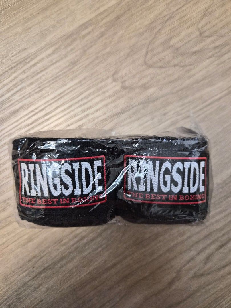 Ringside Hand Wraps - Black, 4.5 Meters (Category: Other Sports Equipment and Supplies) located in Quezon City. Submitted by jhnsn (Listing ID 1434447648, Image 1). Description: - Ringside black hand wraps - Mexican-style - 4.5 meters long (180 inches) - Brand new, in original packaging - Perfect for boxing and combat sports - Slightly elastic cotton-blend wraps designed for superior wrist and knuckle protection - Features a thumb loop and hook-a