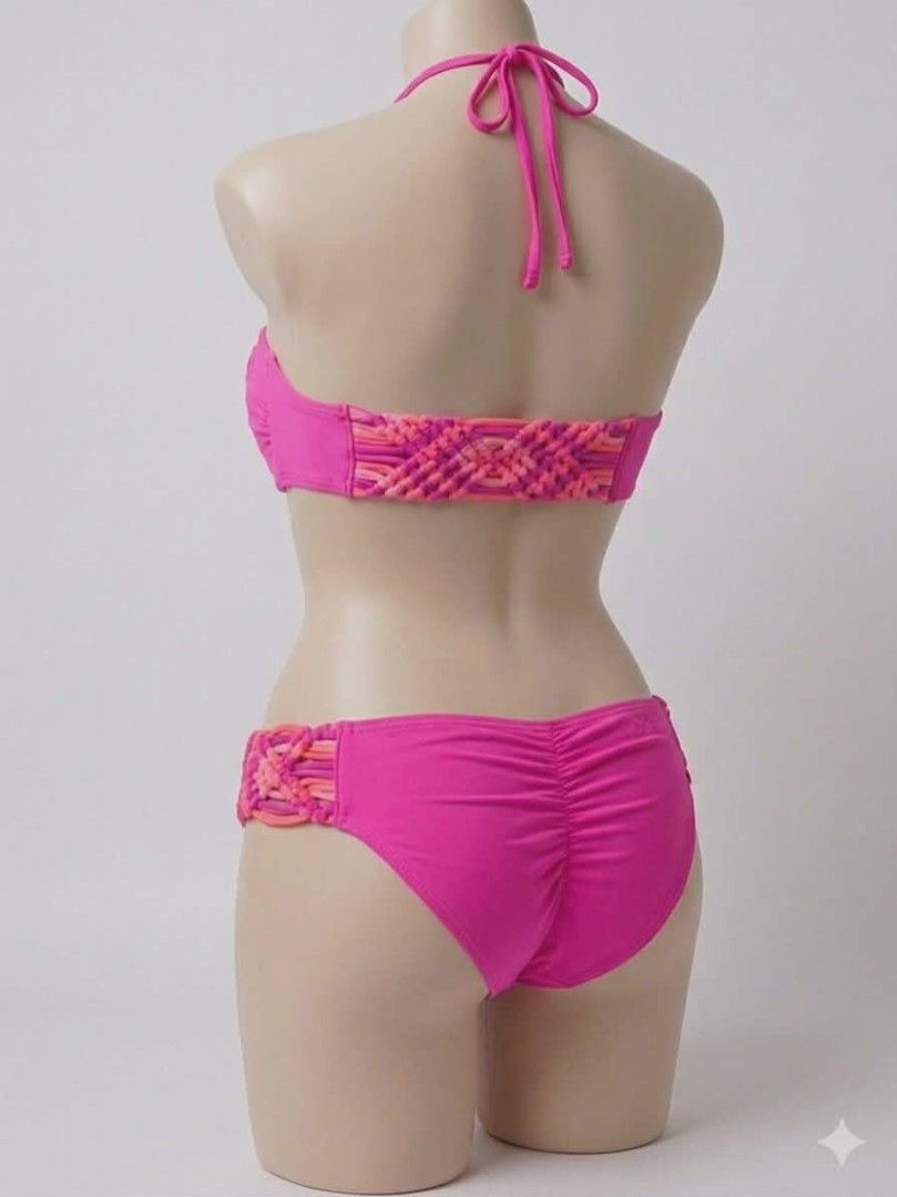 Rip Curl Macramé Bikini Set - Fuchsia Pink (Category: Bikinis & Swimsuits) located in Bacolod City. Submitted by maraline (Listing ID 1432815753, Image 2). Description: ​Brand: Rip Curl ​Size: Tagged as a Size 6 (Fits XS-SMALL) ​Fabric: 80% Polyamide, 20% Lycra (Standard high-quality swimwear stretch). ​Design: Bandeau-style top with macramé center and side detailing; cheeky/standard bottoms with matching macramé hip straps and a "scrunch butt" (