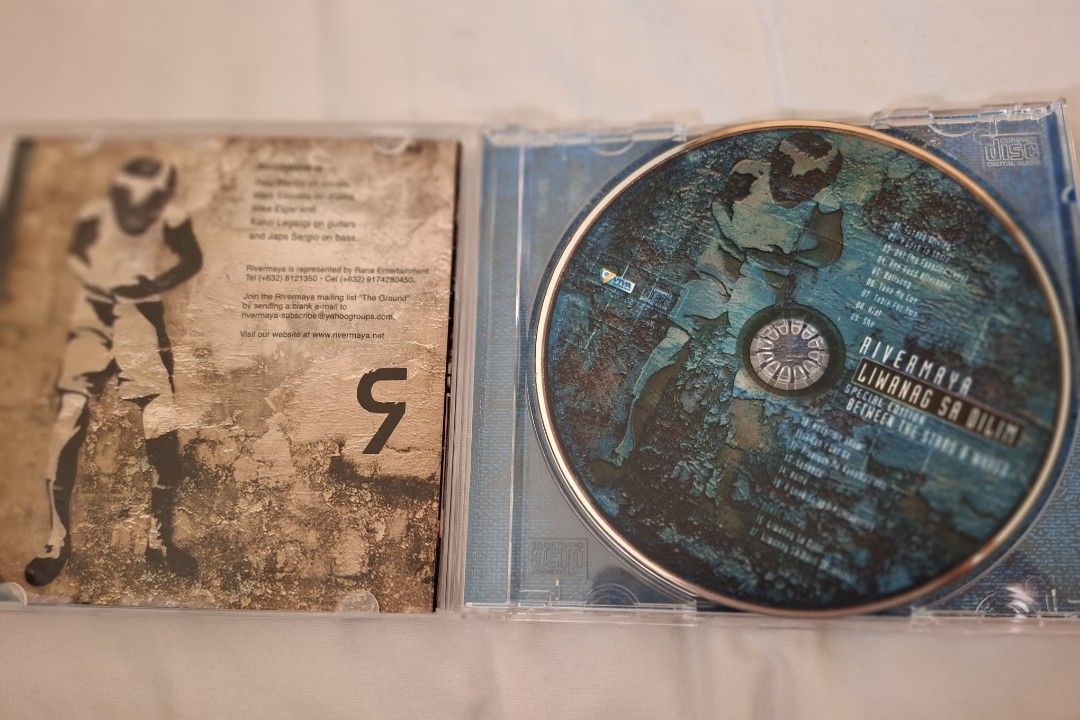 Rivermaya - Liwanag Sa Dilim Special Edition CD (Category: CDs & DVDs) located in Antipolo. Submitted by cychiyo (Listing ID 1434400838, Image 3). Description: - Rivermaya "Liwanag Sa Dilim" CD (Between the Stars & Waves Edition) - Features tracks: "Sunday Driving", "A Love to Share", "241 (My Favorite Song)" - Published by: Viva Records Corporation - Includes: CD and case Last price posted pay via GCash.