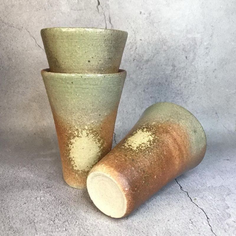 Set of Stoneware Tumblers (Category: Coffee & Tea Tableware) located in Bulacan. Submitted by ceramicscubby (Listing ID 1434579920, Image 2). Description: 🥢 Size: 3.3 D x 4.8 H in. ❗️CLOSING DOWN SALE, ALL PRICES ARE MARKED DOWN. WE WILL NOT BE ACCEPTING OFFERS LOWER THAN OUR ASKING PRICE. ❗️ - Set of three handmade ceramic cups - Unique color gradient: light green to warm brown - Textured surface - Distinctive design - Stamped bottoms.