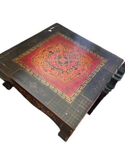 Solid wood coffee table (Category: Tables & Sets) located in Singapore. Submitted by snowflake321 (Listing ID 1434472959, Image 2). Description: Beautiful Tibetan painted coffee table bought from Xian. Dimensions are L75cmx W70cmx H 29cm.Slight painting off at surface. All other areas in good condition. Letting go at very low price for quick sale. First come basis and as in condition. Self collect. .