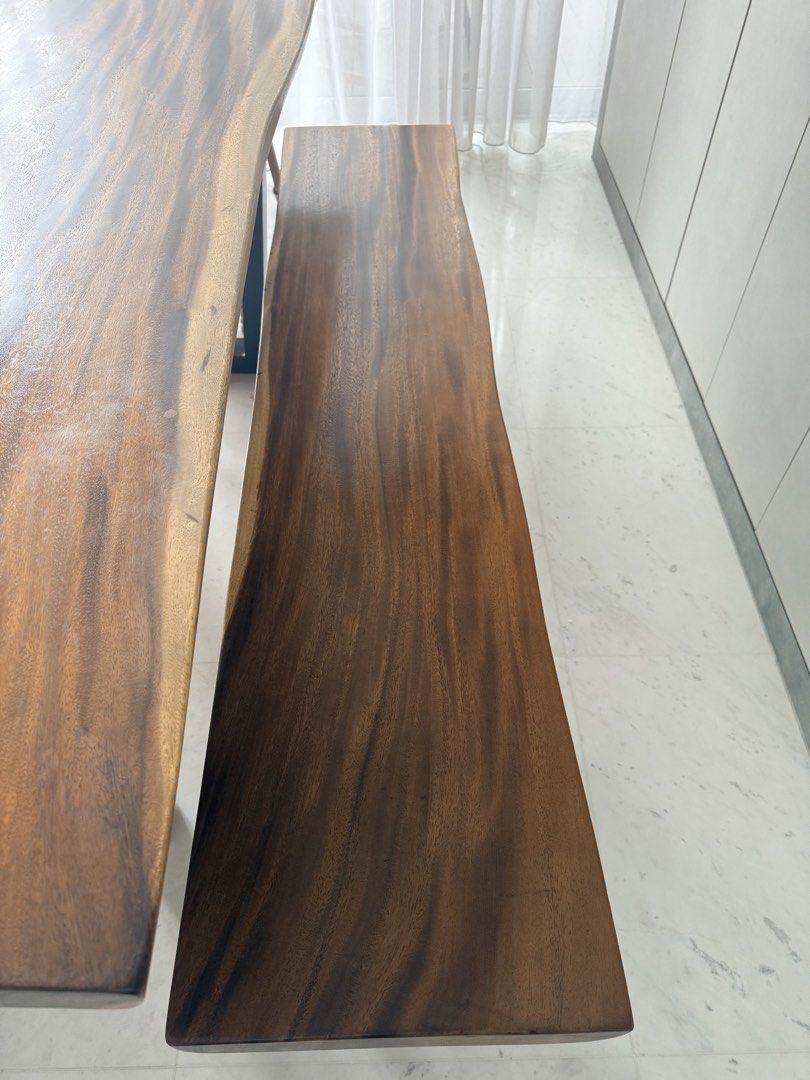 Solid Wood Dining Table (Category: Tables & Sets) located in Singapore. Submitted by hypeandscore (Listing ID 1434482268, Image 3). Description: Now $1100 was $1400for Solid live edge wood Table (180cm X 88/90cm) Now $450 was $600 for Matching Bench (170cm) Now $550 was $750 for 3 Teak chairs $1800 for the whole set. Please arrange for own transport and manpower. Seldom used dining table set and well maintained. Now Available till end June..