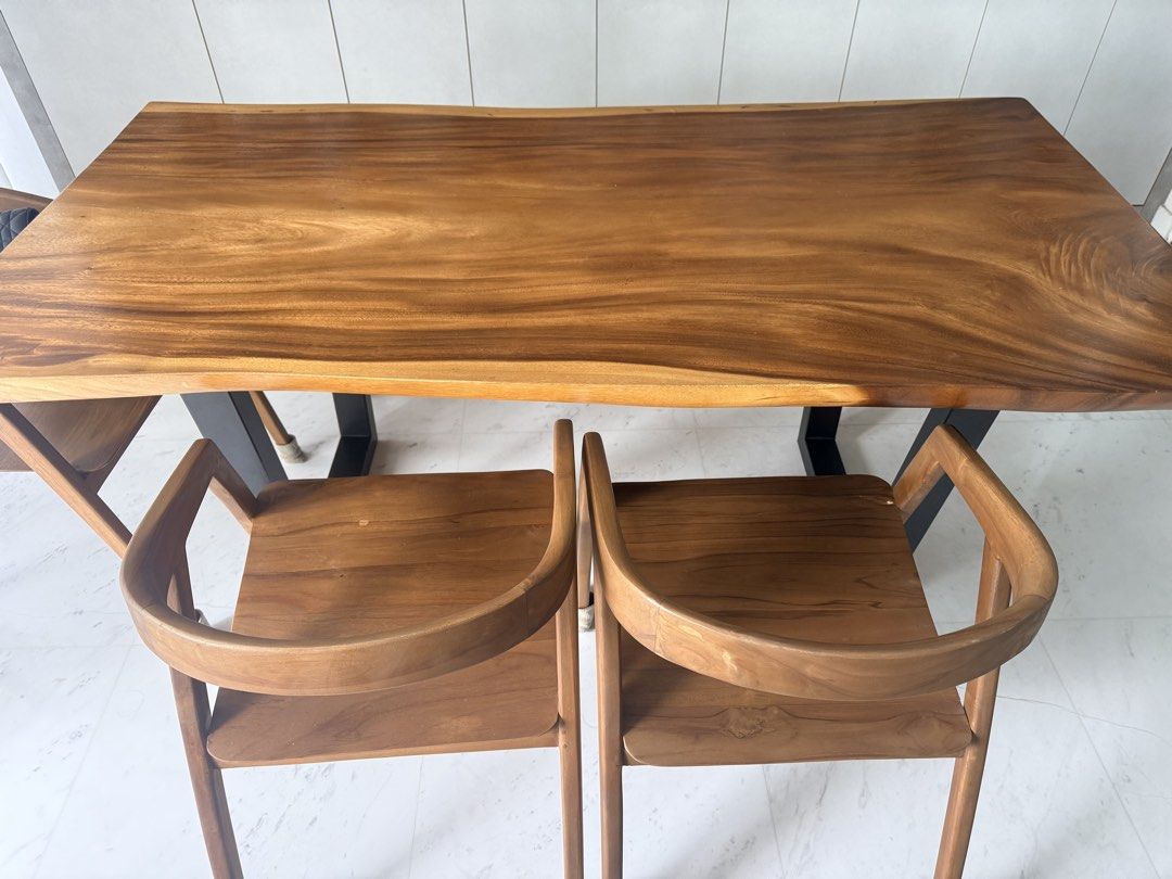 Solid Wood Dining Table (Category: Tables & Sets) located in Singapore. Submitted by hypeandscore (Listing ID 1434482268, Image 2). Description: Now $1100 was $1400for Solid live edge wood Table (180cm X 88/90cm) Now $450 was $600 for Matching Bench (170cm) Now $550 was $750 for 3 Teak chairs $1800 for the whole set. Please arrange for own transport and manpower. Seldom used dining table set and well maintained. Now Available till end June..