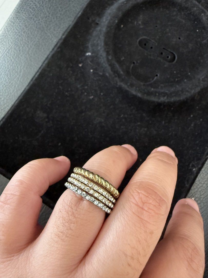 Stackable Rings Set (Category: Rings) located in Bulacan. Submitted by emjay_17 (Listing ID 1434483996, Image 2). Description: - Stackable ring set - Includes: 2 gold-toned rope rings, 2 silver-toned studded rings - Versatile: Wear individually or stacked - Standard size - Suitable for everyday wear.