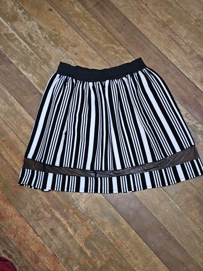 Striped Skirt with Mesh Detail (Category: Skirts) located in Manila. Submitted by corickety (Listing ID 1434465131, Image 1). Description: • Waist Width: 12.5in • Length: 17in • No stains; few loose threads • Very stretchable .