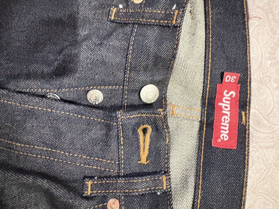 Supreme selvedge raw indigo (Category: Jeans) located in Marikina City. Submitted by surity99 (Listing ID 1434496652, Image 3). Description: - Supreme slim fit jeans - Size 30 - Made in Japan - raw indigo - Button fly - Red selvedge - Leather patch - 100% cotton Waist 15.5 Rise 10.8 in Inseam 29.4 in (chainstitch hemmed) Hem width 7.7 in.