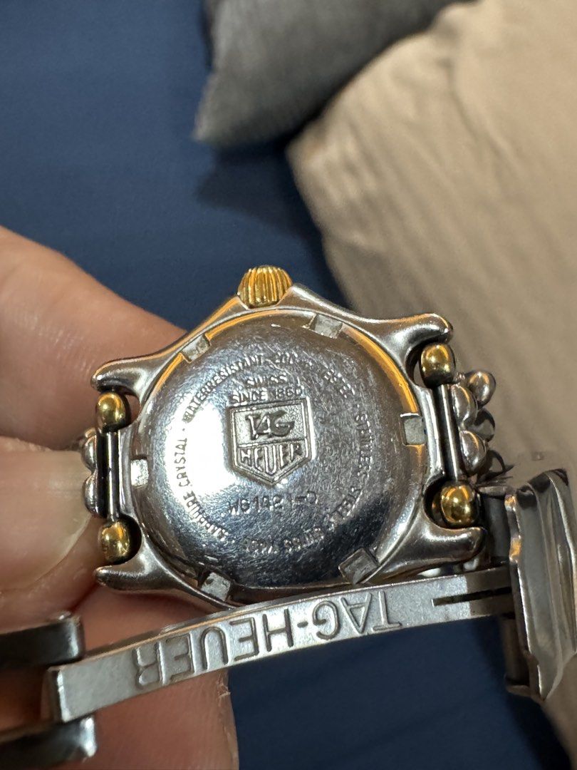 Tag Heuer Two Toned Ladies Watch (Category: Women's Watches) located in Taytay. Submitted by everythingonline888 (Listing ID 1434565137, Image 3). Description: - Tag Heuer Professional 200 Meters watch - Gold and silver-toned bracelet and bezel - White dial - Date display - Swiss made - Marked with "TAG HEUER" and "SWISS SINCE 1860" on the back No inclusions Signs of wear Slightly negotiable.