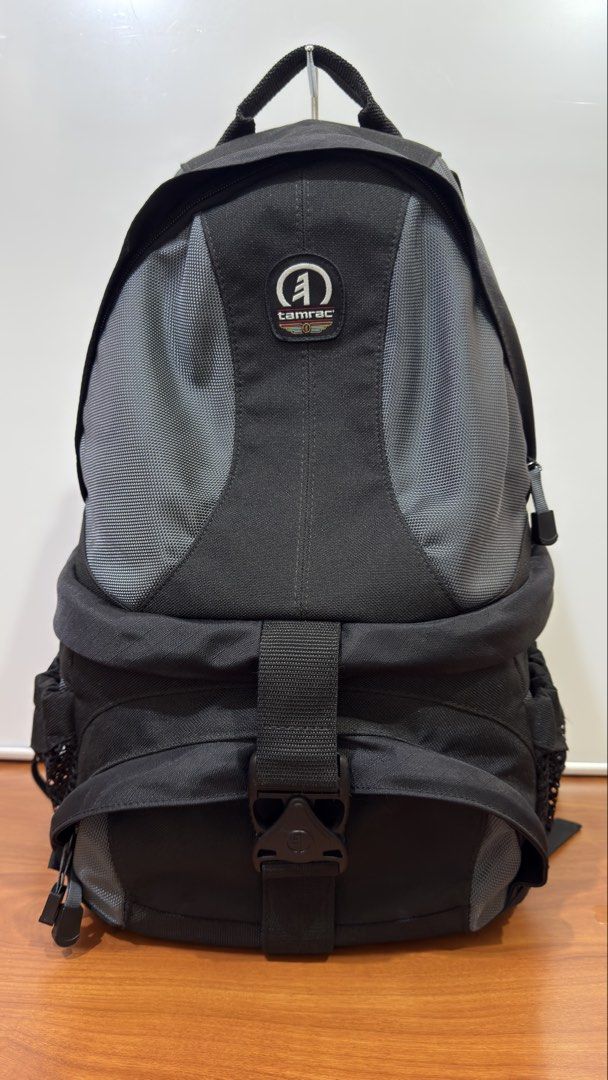 Tamrac Adventure 7 Camera Backpack (Category: Camera Bags & Carriers) located in Binangonan. Submitted by c_r_i_s (Listing ID 1434402183, Image 1). Description: Key Features Dual-Compartment Design: The backpack features a completely foam-padded lower section specifically for camera gear, while the unpadded upper section functions as a traditional backpack for personal items Protective Camera Section: The lower compartment is lined with high-dens