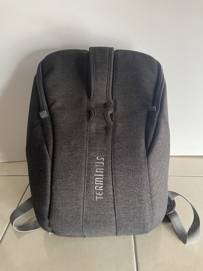 Terminus Backpack (Category: Backpacks) located in Kuala Lumpur. Submitted by pfsam (Listing ID 1434455342, Image 1). Description: - Dark grey Terminus backpack - Adjustable straps - Main compartment - Internal zippered pocket - Padded back straps for comfort - laptop compartment at the back - come with rain cover .