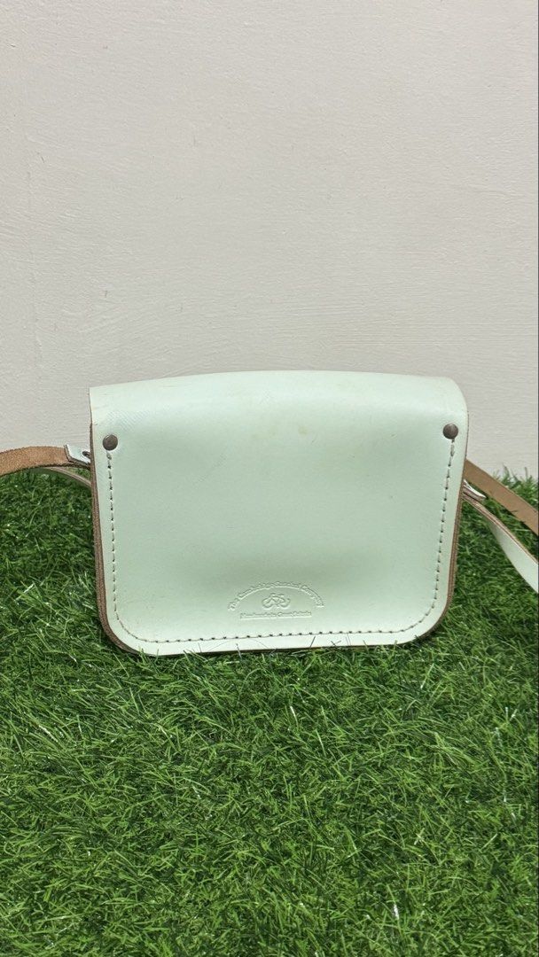 The Cambridge Satchel Mini Sling Bag with Aries Embossed Sign (Category: Cross-body Bags) located in Lingayen. Submitted by thrft.dpts (Listing ID 1434539678, Image 3). Description: The Cambridge Satchel Mini Sling Bag with Aries Embossed Sign Color: Mint Green.