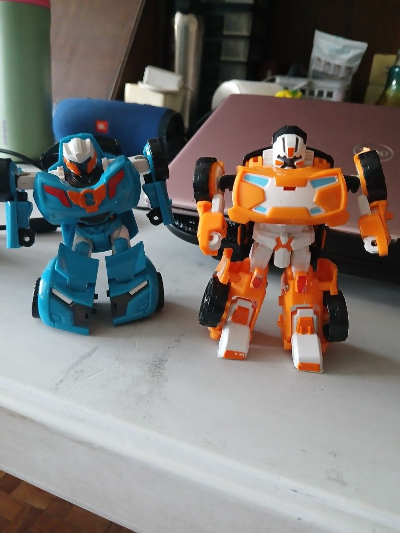 TOBOT X AND Y (Category: Vehicle & Diecast Models) located in Quezon City. Submitted by lorenzomarcalain (Listing ID 1434455337, Image 2). Description: - Transforming toy cars available! - Colors: Orange (with white and blue accents) and Blue (with orange accents). - Features: Transforms into robots. - Wheels: Black. - Condition: Good. 350 each.