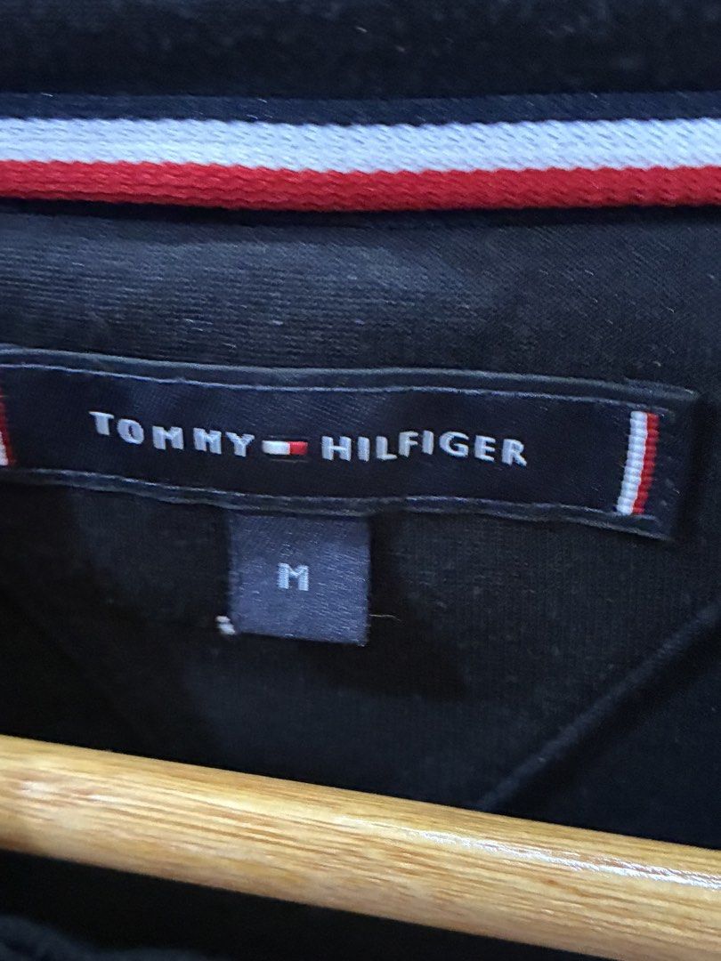 Tommy Hilfiger Black Hoodie - Size M (Category: Hoodies) located in Makati City. Submitted by lps.ph (Listing ID 1434447876, Image 2). Description: Issue - May hole sa side .