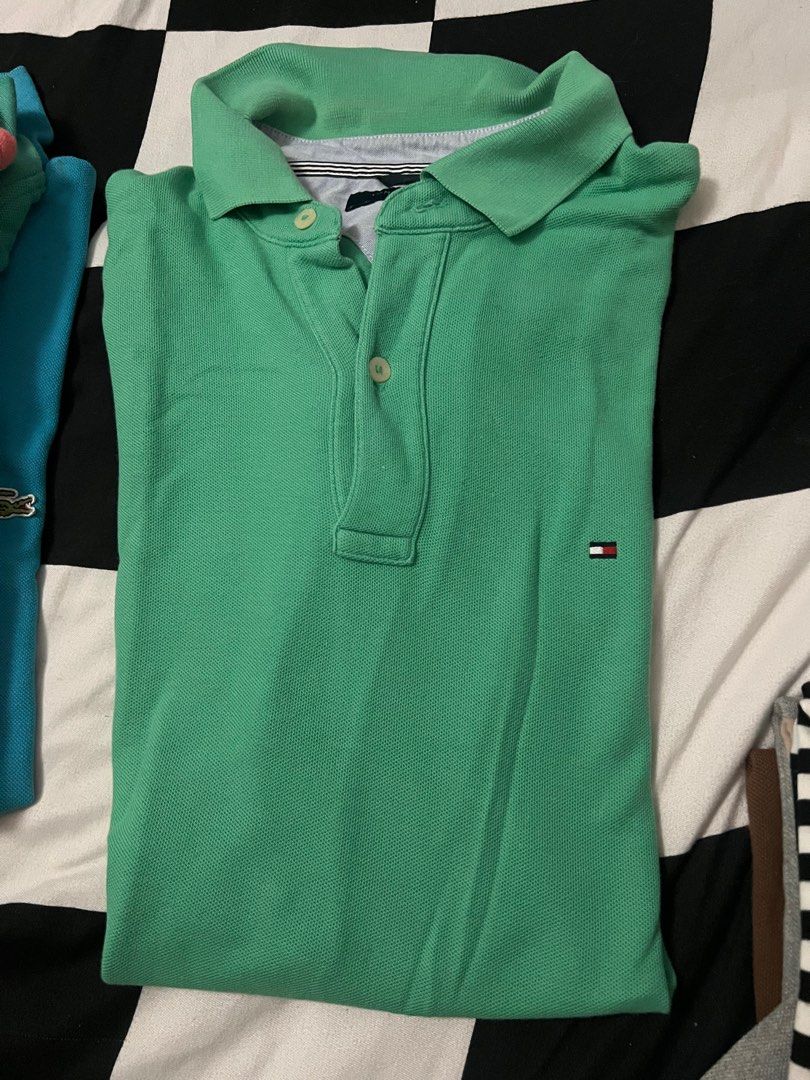 Tommy Hilfiger Small Logo Polo Shirt (Category: Tshirts & Polo Shirts ) located in Las Pinas. Submitted by ffinds (Listing ID 1434389092, Image 1). Description: Tommy Hilfiger Small Logo Polo Shirt Size L on tag 23x29 dimensions Good Condition Alabang/Las Pinas loc.