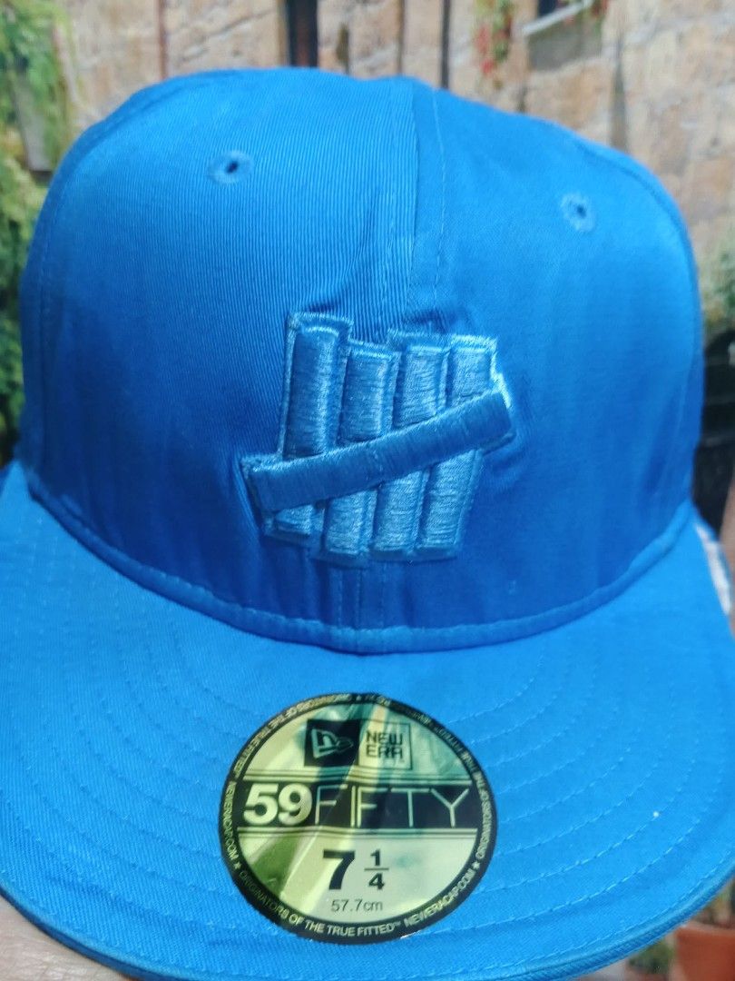 Undefeated blue cap new era size 7 1/4 (Category: Caps & Hats) located in Valenzuela. Submitted by shs.by.marc (Listing ID 1434389654, Image 2). Description: Location : Karuhatan Valenzuela.