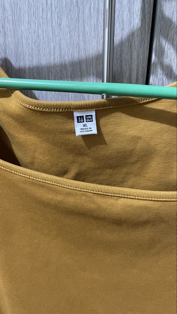 Uniqlo Square Neck Crop Top XL (Category: Shirts) located in Mandaluyong City. Submitted by ptsarm (Listing ID 1434511728, Image 3). Description: - Uniqlo crop top - Color: Mustard Yellow - Size: XL.