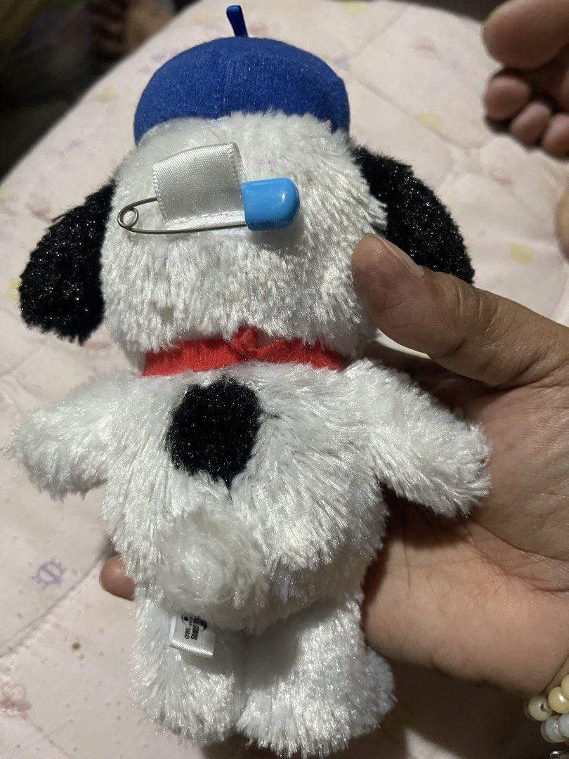 Universal Studios Snoopy Plush Toy olaf (Category: Plushies & Soft Toys) located in Muntinlupa City. Submitted by joanofarc1013 (Listing ID 1434441480, Image 2). Description: - Cute Snoopy plush toy - From Universal Studios - Features a blue cap and red collar - Includes a paw print tag - Has a black spot on the back - Comes with a patch secured by a safety pin - Dated 2015 - Great collectible for Snoopy fans!.