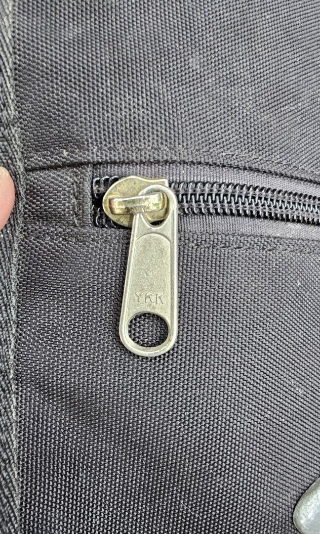 Vintage Oakley Sling (Category: Sling Bags) located in Kibawe. Submitted by Thrift_ni_Babac (Listing ID 1434490922, Image 3). Description: For Sale Vintage Oakley Sling Bag Adjustable Strap 9 inches Height 8 inches Width Sign of usage Nka ykk lahat nang zippers See last photo for issue.