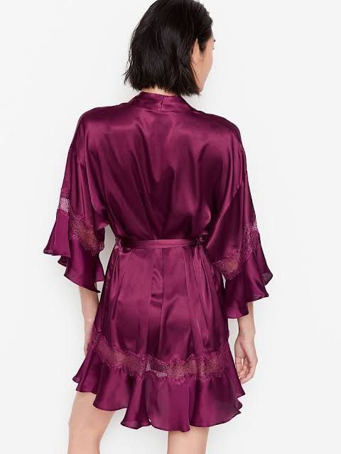 VS satin ruffled hem lace trim robe (Category: Undergarments & Loungewear) located in Baguio. Submitted by thecloset.bg (Listing ID 1434450117, Image 2). Description: satin-like purple ruffled robe, with a casual design, creates a relaxed atmosphere. Replaced belt M/L on tag actual is freesize - Color: Purple - Design: Frilled robe - Material: Satin-like - Sleeves: Flared sleeves - Style: Casual.