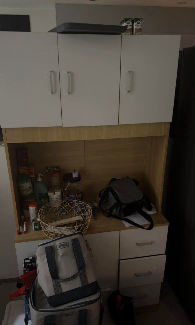 Wooden Cabinet with Drawers (Category: Shelves, Cabinets & Racks) located in Manila. Submitted by rshaw_ (Listing ID 1434405196, Image 1). Description: - Wooden cabinet - Upper cabinets and lower drawers - Light wood finish - White cabinet doors and drawers - Shelf for storage - Silver handles - Perfect for kitchen or storage.