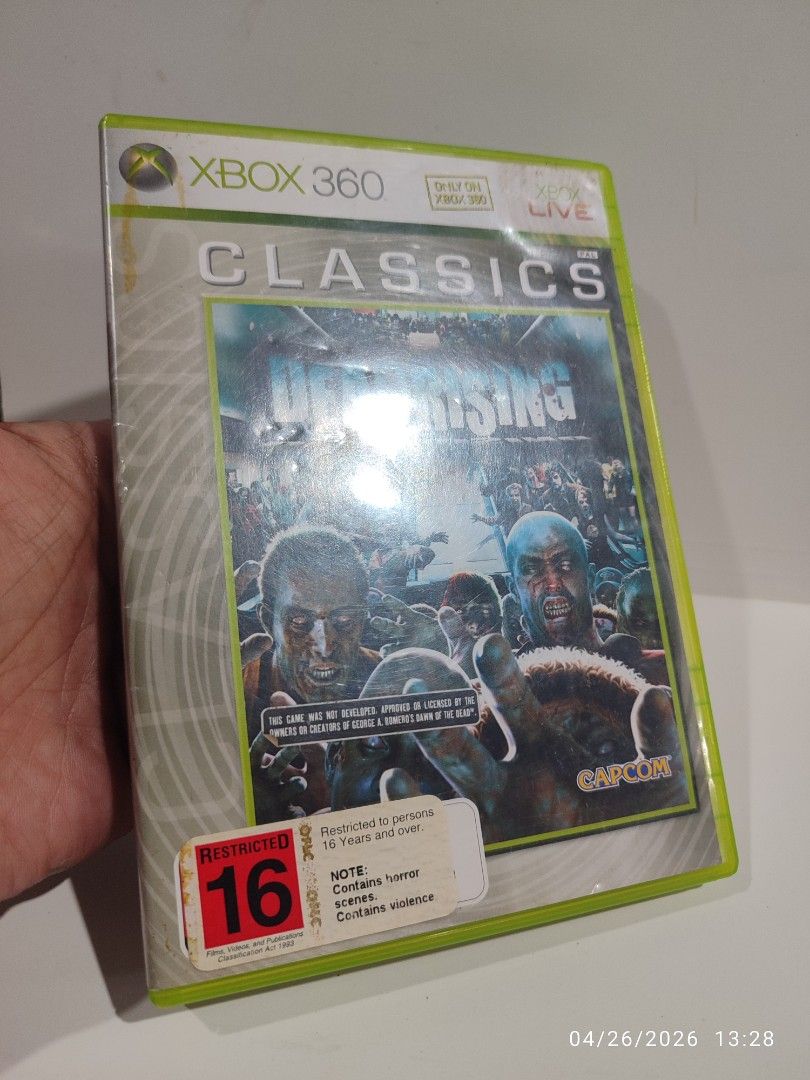 XBOX 360 - Dead Rising (PRE-OWNED) "OPEN REGION" (Category: Xbox) located in Mendez-Nunez. Submitted by sf2_gameshop (Listing ID 1434592552, Image 2). Description: PLEASE READ The disc will work on any Xbox 360 units regardless of region. PAL - √ (Yes) NTSC/J - √ (Yes) NTSC - √ (Yes) CONDITION: a pre-owed item. The disc has some scratches. Tested working. It comes with a game manual. GENRE: Action-adventure PLAYERS: 1 REGION: PAL, but this is an 