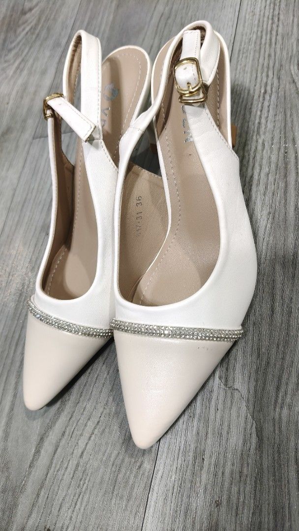 YDEN Slingback Heels with Rhinestones (Category: Heels) located in Taguig. Submitted by suzzyb. (Listing ID 1434490273, Image 2). Description: - YDEN slingback heels - Size 36 - Pointed toe with rhinestone trim - White and beige color scheme - Buckle closure - Slingback strap - Perfect for special occasions.