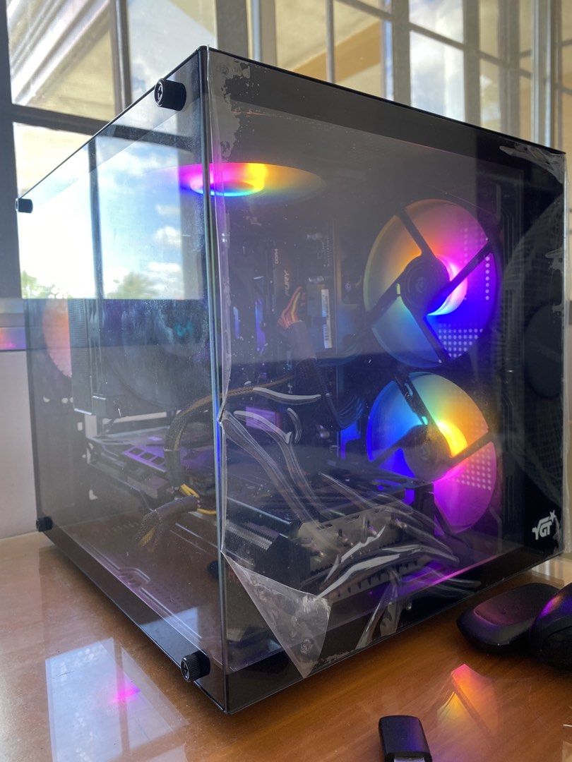pc case for gaming (with 7 working fans) (Category: Desktops) located in Naga. Submitted by andre5000xd (Listing ID 1434401247, Image 1). Description: (photo shown as example of a build) YGT M235 Case - Micro ATX form factor - Gaming case designed for gamers - Designed for small case builds - Comes with 1 x usb 2 port, 1 x usb 3 port and audio/mic port. - Recommended for minimalist users - Recommended for minimalist build. - CPU cooler clearance: