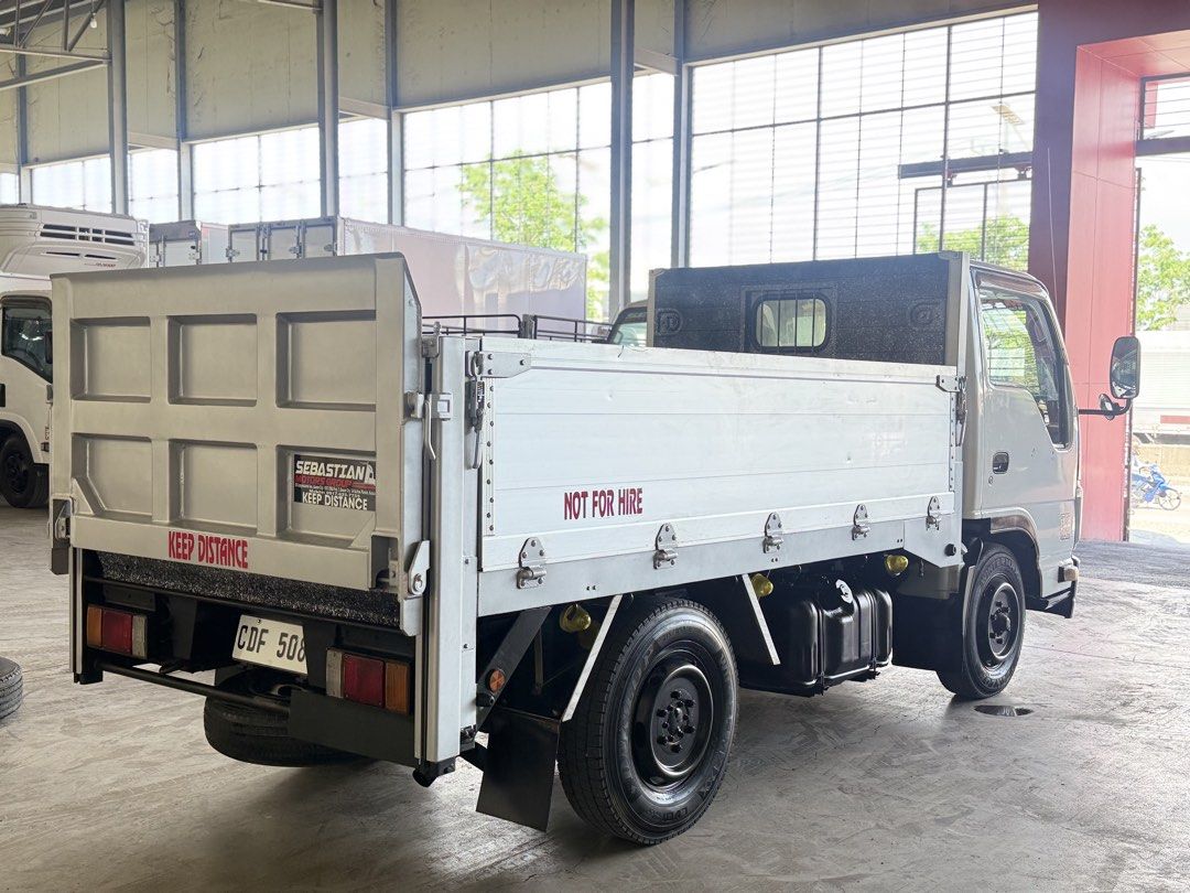 10ft. Isuzu Elf Dropside with lifter Single Tire (Category: Heavy Vehicles) located in Bulacan. Submitted by arvin_custodio (Listing ID 1434741238, Image 3). Description: Isuzu Elf Dropside with lifter 10ft Single tire (4 Wheeler) 4JJ1 engine 2025 year model Complete papers Ready to pullout Call: 09190969833.
