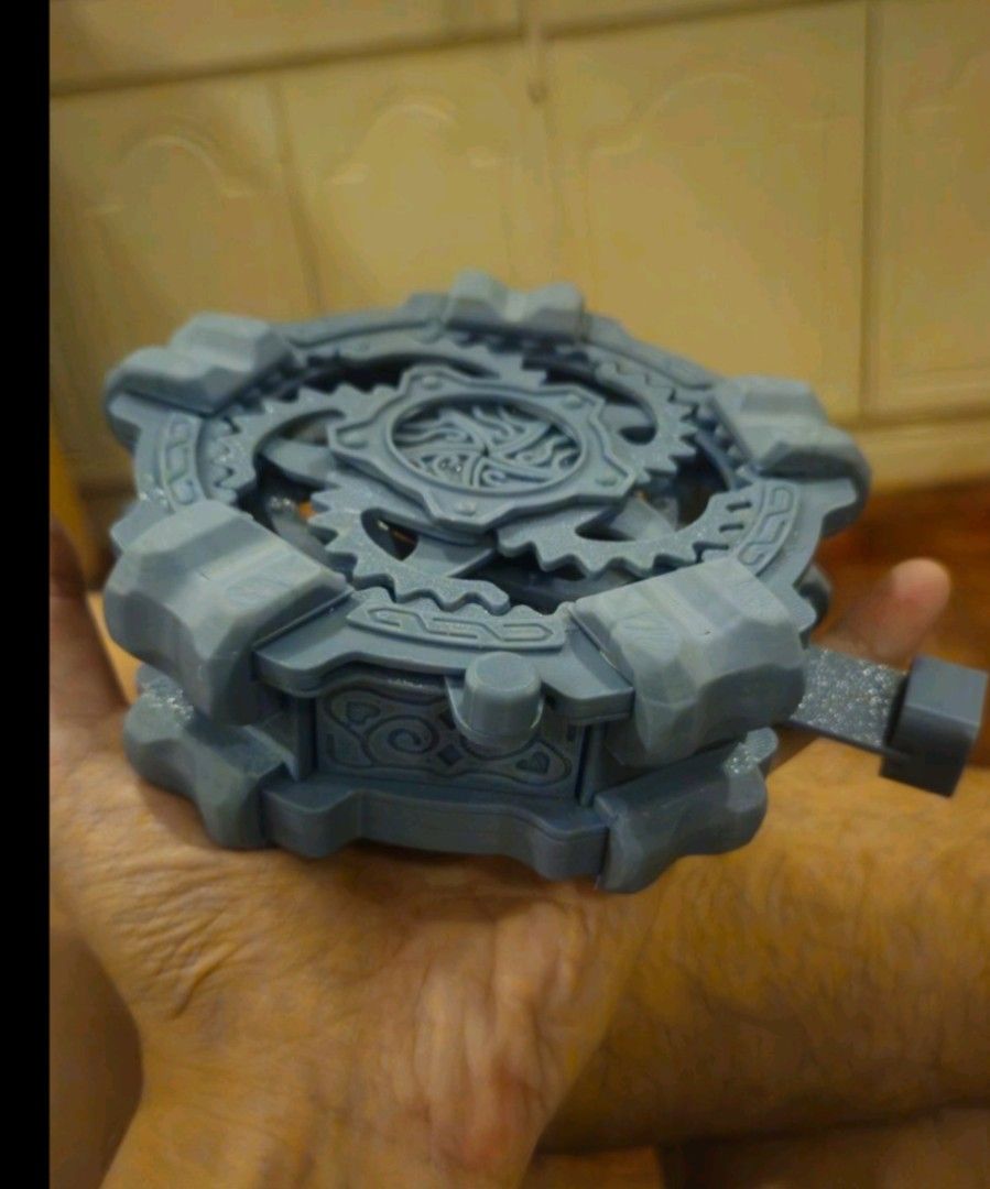3D Printed pill box (Category: Storage Boxes & Baskets) located in Manila. Submitted by keemsonche05269 (Listing ID 1434773984, Image 1). Description: - 3D-printed box - Gear design on top - Unique locking mechanism - Intricate details - Gray plastic - Perfect size for small items.