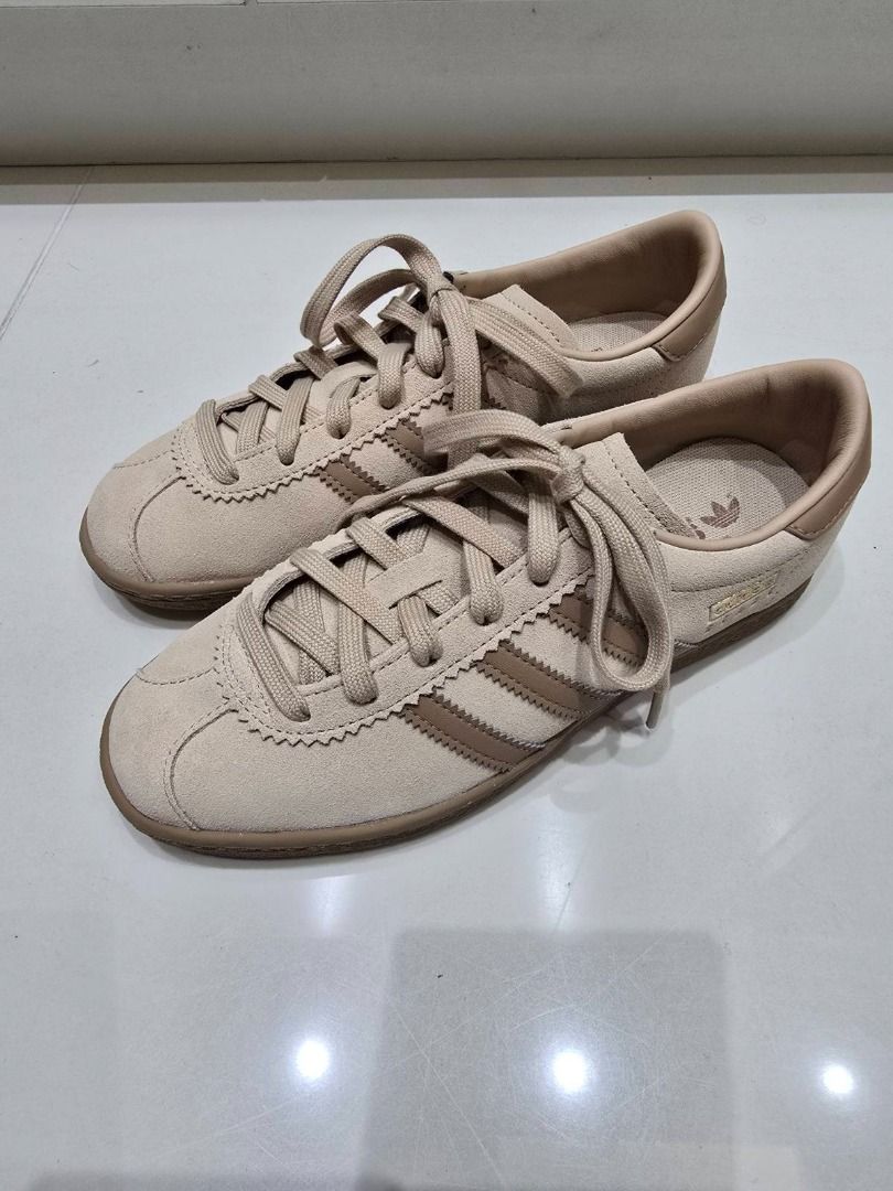 Adidas Stadt Beige Sneakers (Category: Sneakers) located in Makati City. Submitted by michaelbryant (Listing ID 1434669216, Image 1). Description: - Adidas STADT sneakers - Magic Beige/ Cardboard / Gold Metallic - Leather and synthetic upper - Textile and synthetic lining - EVA outsole - US 5.5 / UK 5 / EUR 38 / JPN 235 - Includes original box - Purchased from Seoul.