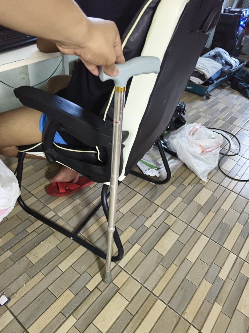 Adjustable Walking Cane (Category: Medical Supplies & Tools) located in Manila. Submitted by ryanjayvd_443 (Listing ID 1434705128, Image 3). Description: - Adjustable height - Gray handle - Silver shaft - Rubber tip for added stability - Ergonomic handle for comfortable grip - Provides walking support.