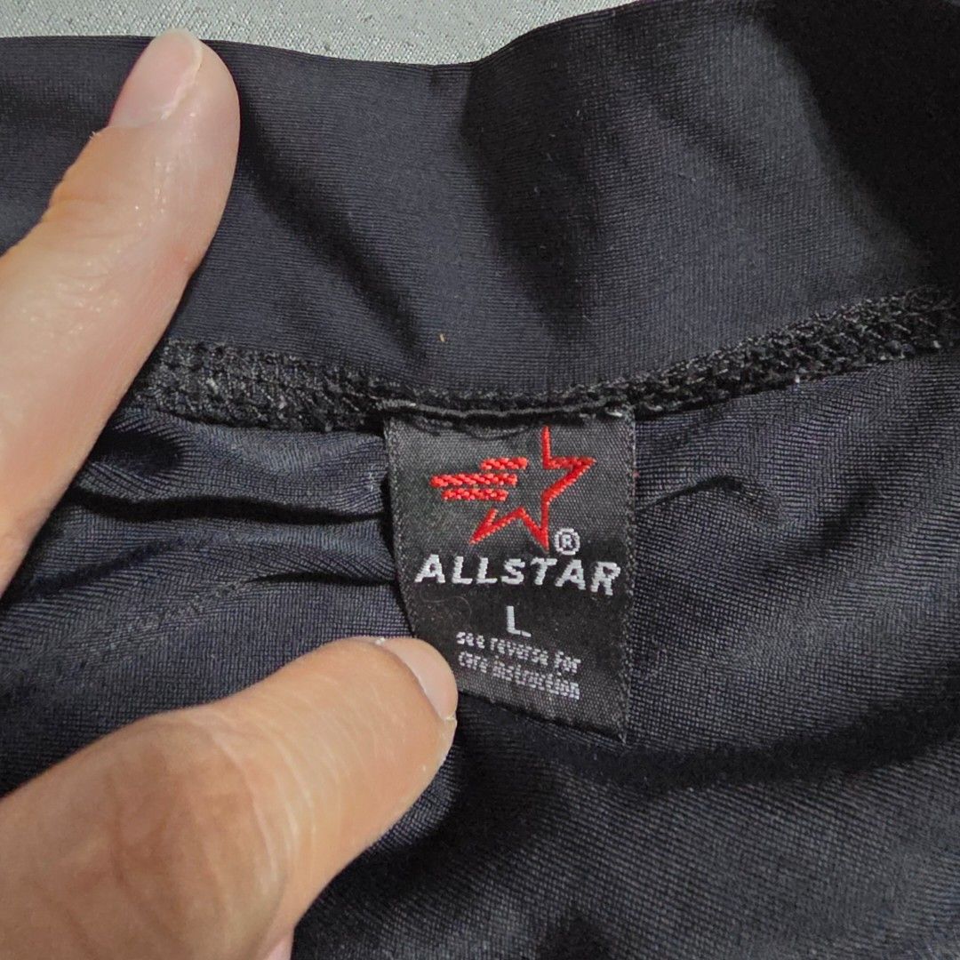 Allstar Black Rashguard - Size L (Category: Rash guard) located in Manila. Submitted by plussizedpixie (Listing ID 1434746871, Image 2). Description: - Color: Black - Size: L - Small logo on chest - Crew neck - Long sleeves - Lightweight material.