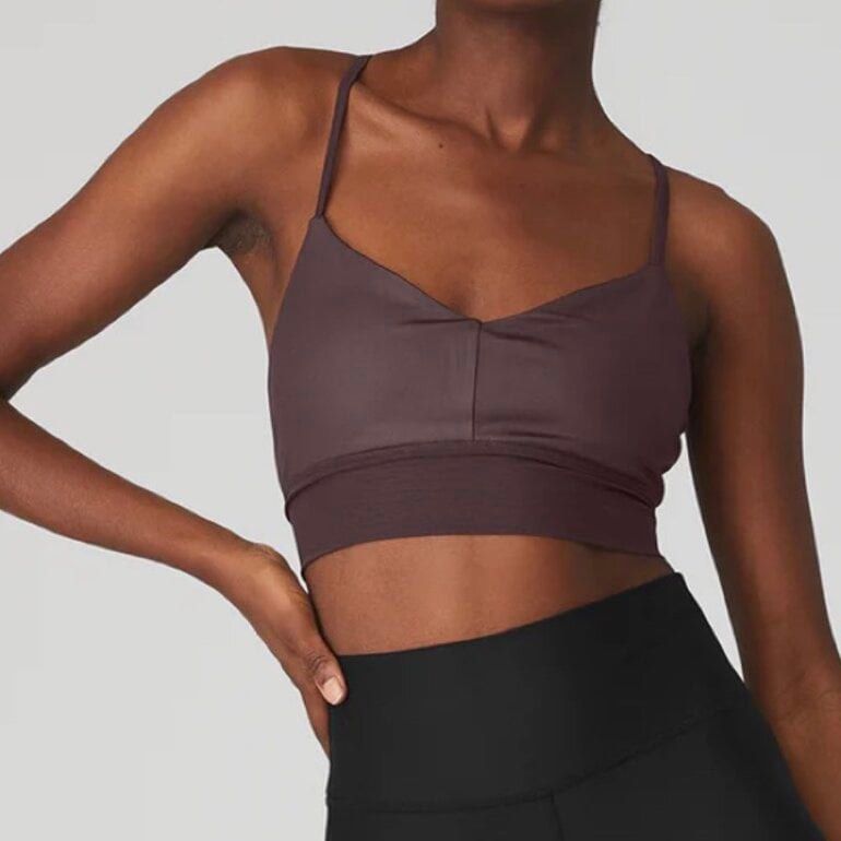 Alo Yoga Lavish Bra (Category: Activewear) located in Taguig. Submitted by stylewearabouts (Listing ID 1434796400, Image 2). Description: - Alo Yoga Lavish Bra size L - Strappy back design - Flattering V-neckline - On trend high neck silhouette with criss cross detail - Mesh fabric blocking for breathability - Feminine chest band seaming detail - Made of smooth, stretchy material - Built-in band for support and comfort - Size tag visible in photo
