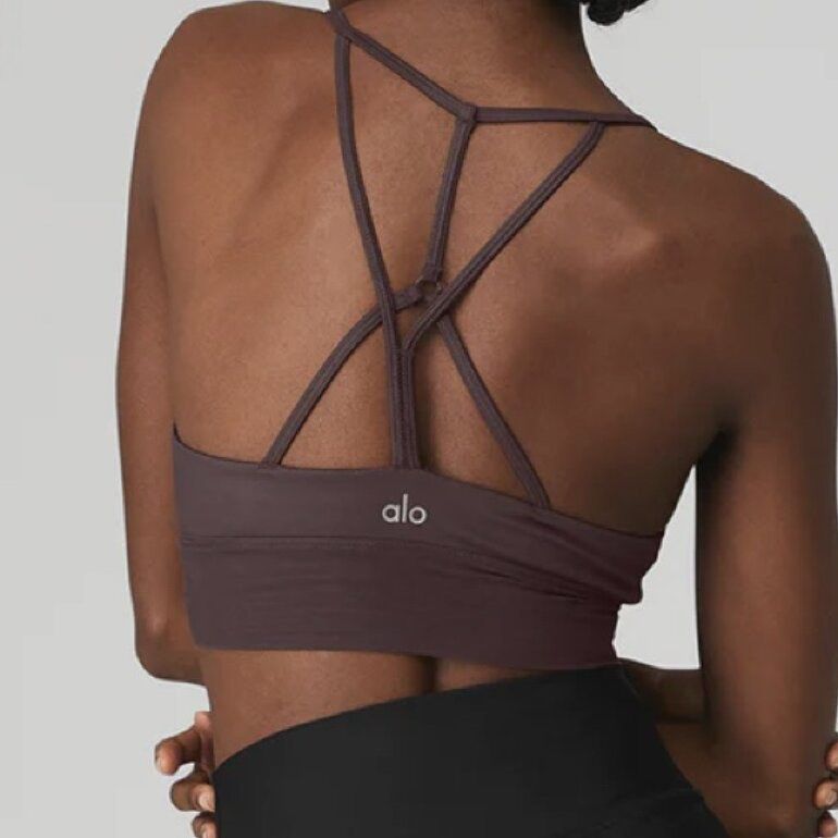 Alo Yoga Lavish Bra (Category: Activewear) located in Taguig. Submitted by stylewearabouts (Listing ID 1434796400, Image 1). Description: - Alo Yoga Lavish Bra size L - Strappy back design - Flattering V-neckline - On trend high neck silhouette with criss cross detail - Mesh fabric blocking for breathability - Feminine chest band seaming detail - Made of smooth, stretchy material - Built-in band for support and comfort - Size tag visible in photo