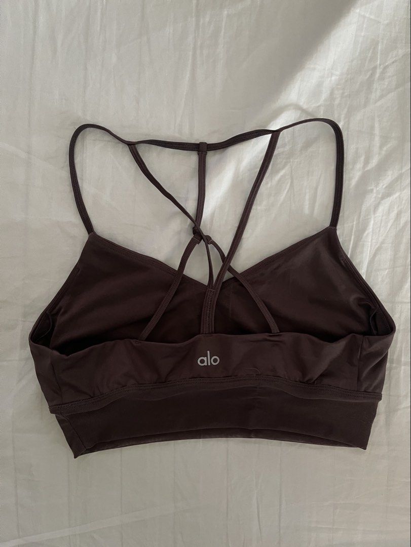 Alo Yoga Lavish Bra (Category: Activewear) located in Taguig. Submitted by stylewearabouts (Listing ID 1434796400, Image 3). Description: - Alo Yoga Lavish Bra size L - Strappy back design - Flattering V-neckline - On trend high neck silhouette with criss cross detail - Mesh fabric blocking for breathability - Feminine chest band seaming detail - Made of smooth, stretchy material - Built-in band for support and comfort - Size tag visible in photo