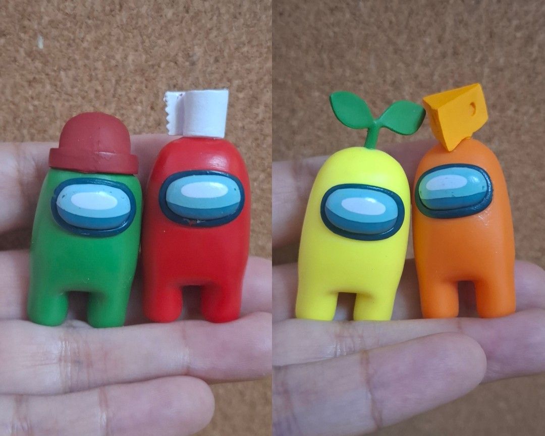 Among Us Figurines Set (Category: Designer & Blind Box Toys) located in Cagayan de Oro. Submitted by FlooffsEtc (Listing ID 1434782504, Image 2). Description: SET OF FOUR Among Us Figurines Includes: - Green character with a hat - Red character with a toilet paper roll - Yellow character with leaves - Orange character with cheese InnerSloth LLC markings Approx. 4.5-5cm height, 2cm width May be bundled with other items. Message first to confirm co