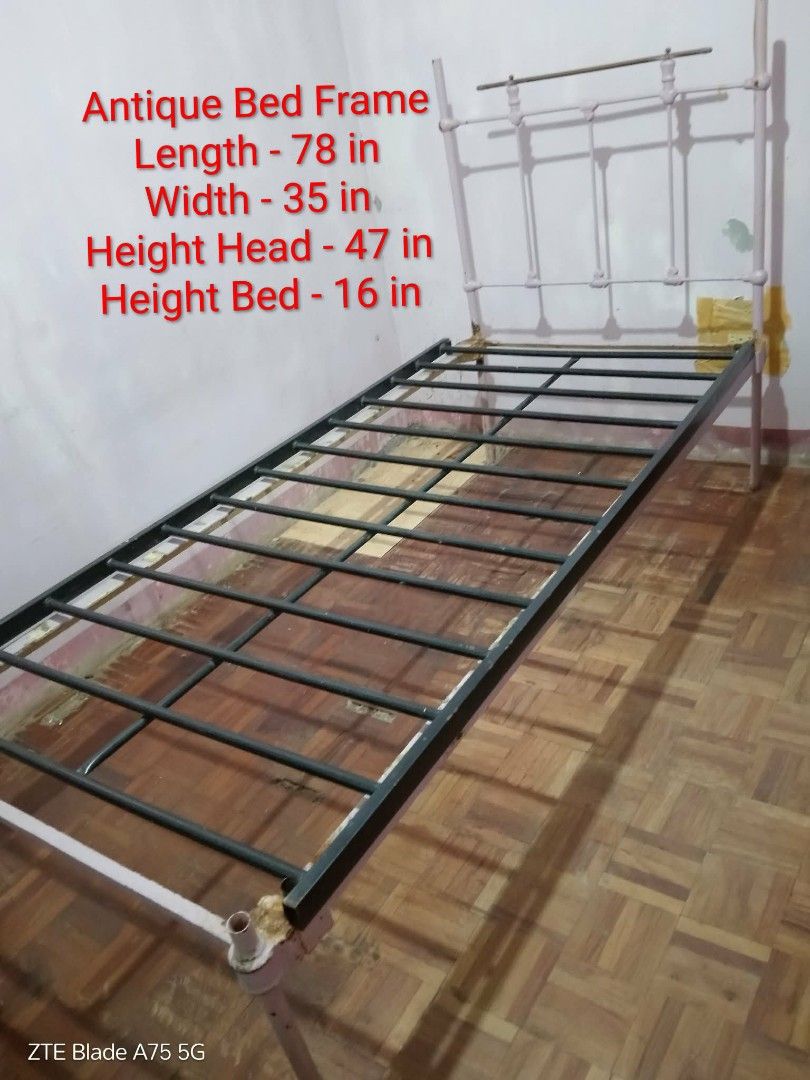 Antique Metal Bed Frame (Category: Bed Frames & Mattresses) located in Lucena. Submitted by miles.miles1 (Listing ID 1434627623, Image 1). Description: - Antique metal bed frame - Fits a single mattress - Dimensions: - Length: 78 inches - Width: 35 inches - Head Height: 47 inches - Bed Height: 16 inches - Features a metal grid for mattress support - Painted in a light color - Antique design.