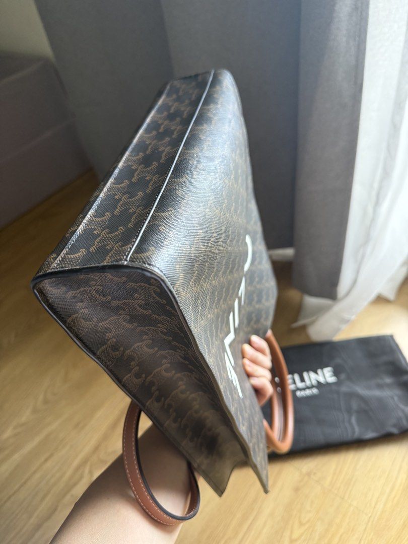 Authentic Celine triomphe Vertical Cabas Tote (Category: Luxury Bags & Wallets) located in Quezon City. Submitted by jakalalo22 (Listing ID 1434712017, Image 3). Description: 2 way bag Has minimal flaw. But overall condition— Very good With Dustbag With long strap Gold hardware Stampcode visible Clean outside and inside.